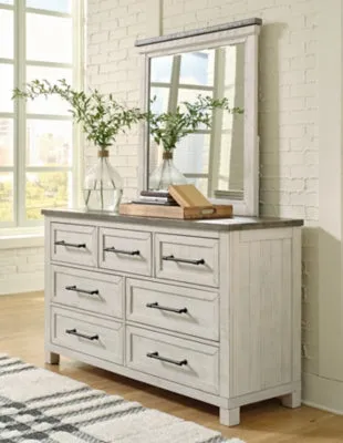Brewgan King Panel Storage Bed with Mirrored Dresser and Chest