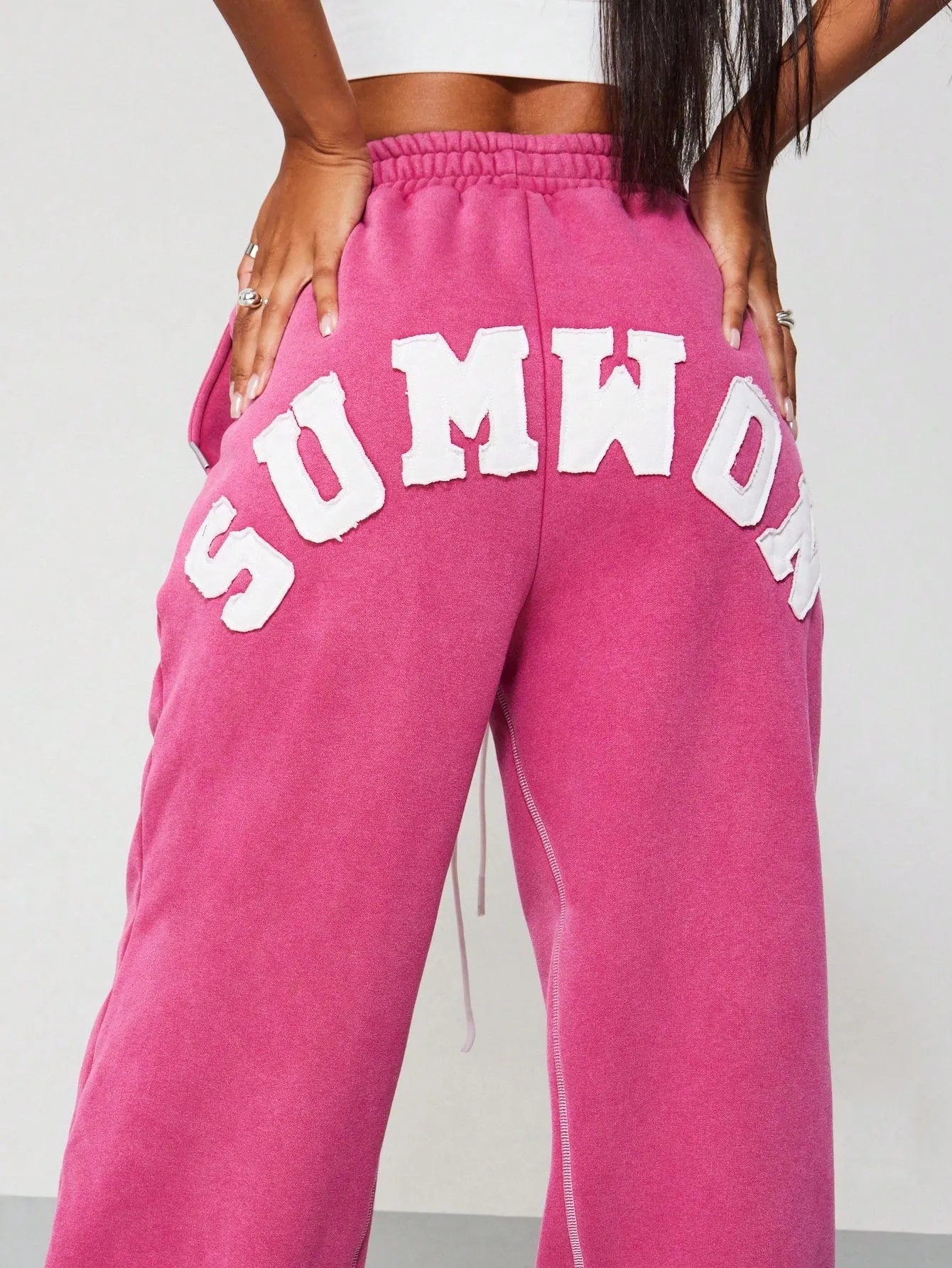 SUMWON WOMEN Wide Leg Washed Sweatpants With Back Applique Design